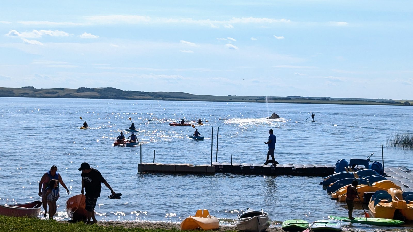 Group enjoying a boat rental day on the lake